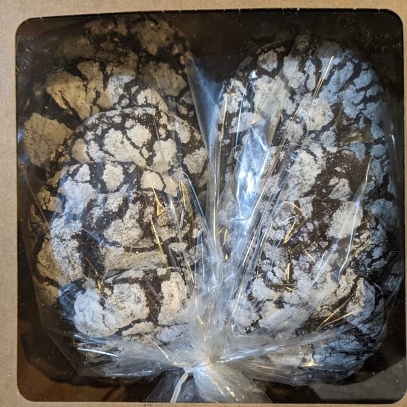 A box of our indulgent chocolate crinkle cookies.